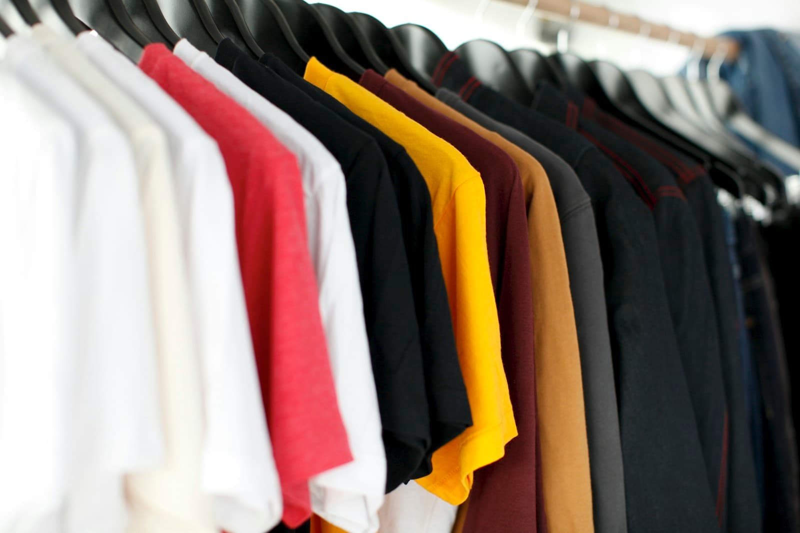 A rail of printed merch, print on demand without regrets